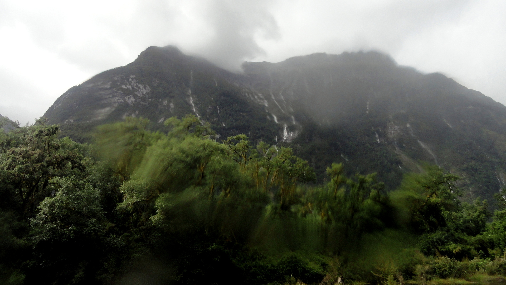 Waterfall Hillside Through Raindrops